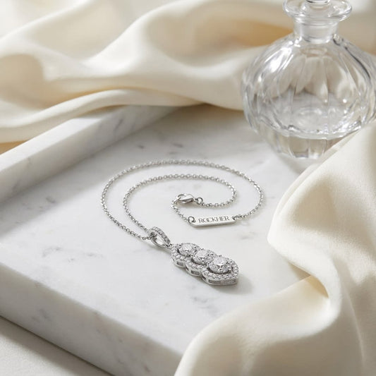 Natural Diamond Round Brilliant Pendant in 14K White Gold, on marble vanity tray with silk