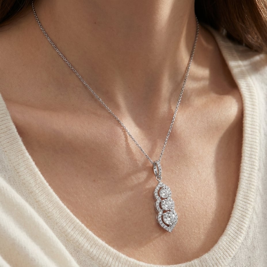 Natural Diamond Round Brilliant Pendant in 14K White Gold, worn close-up portrait