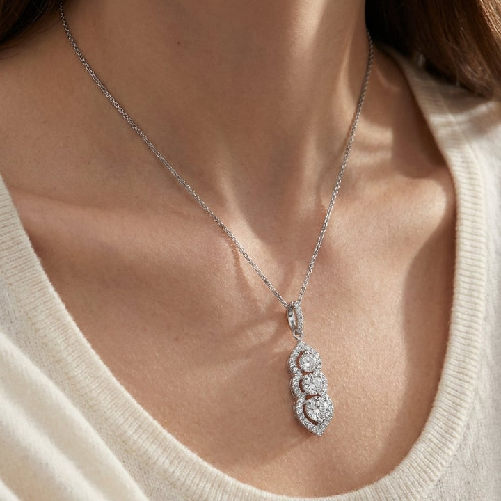 Natural Diamond Round Brilliant Pendant in 14K White Gold, worn close-up portrait