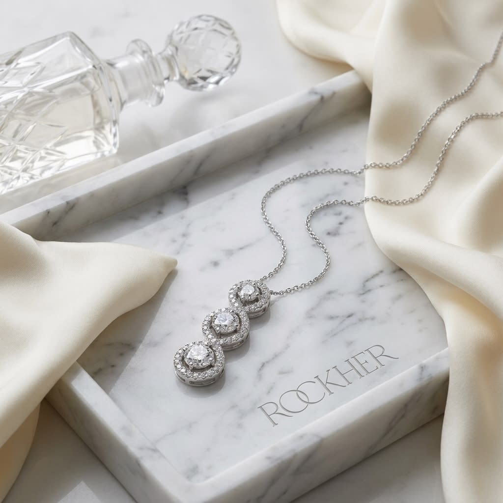 Natural Diamond Round Brilliant Pendant in 14K White Gold, on marble vanity tray with silk