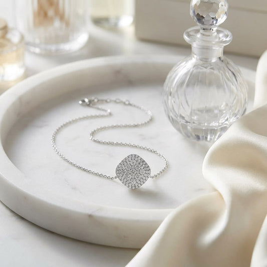 Natural Diamond Cushion Pendant in 14K White Gold, on marble vanity tray with silk