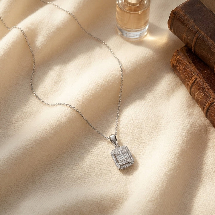 Diamond Baguette & Round Illusion Emerald-Cut Halo Pendant with Solid Bail in 14K White Gold - flat lay