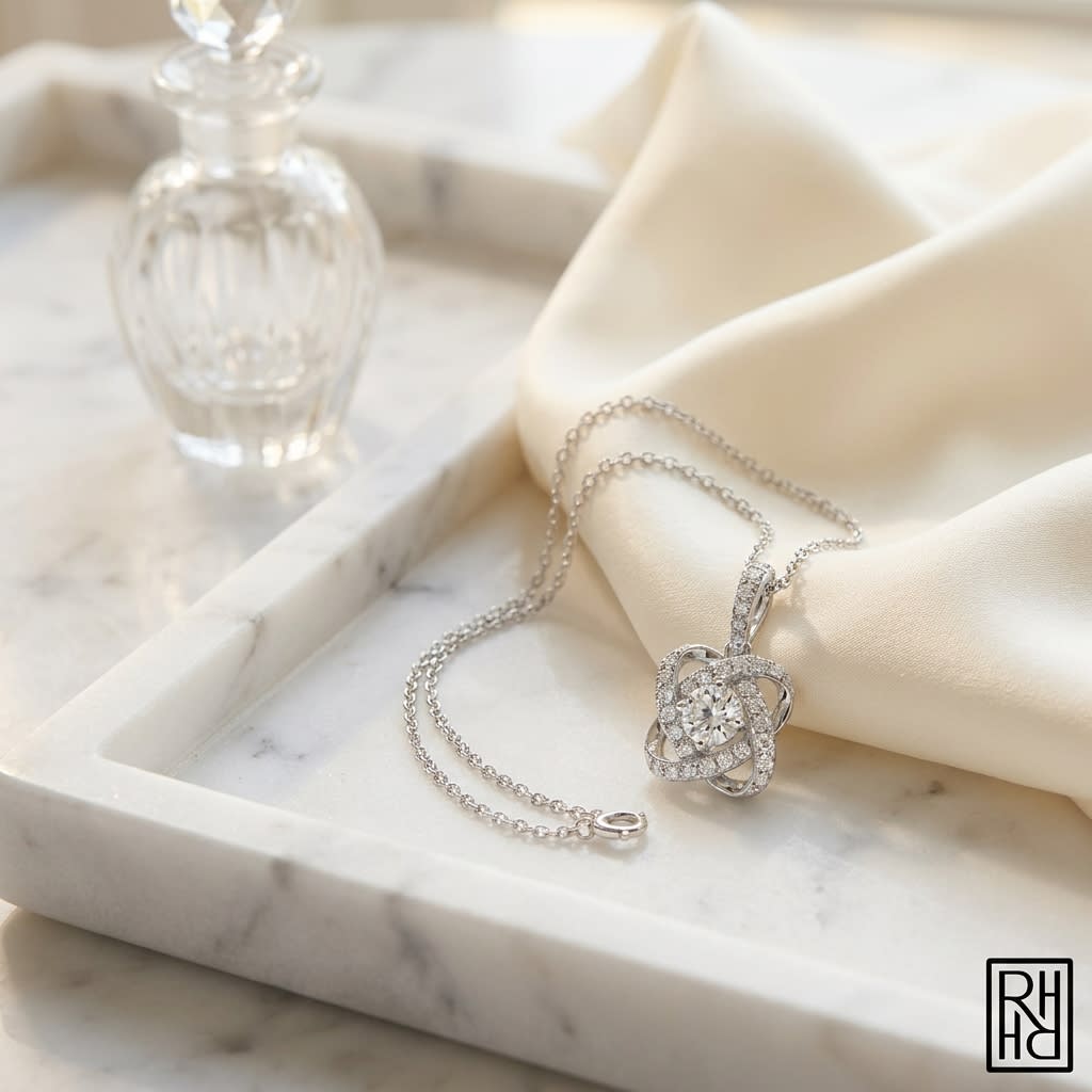 Round Diamond Cross Pavé Pendant in 14K White Gold, on marble vanity tray with silk
