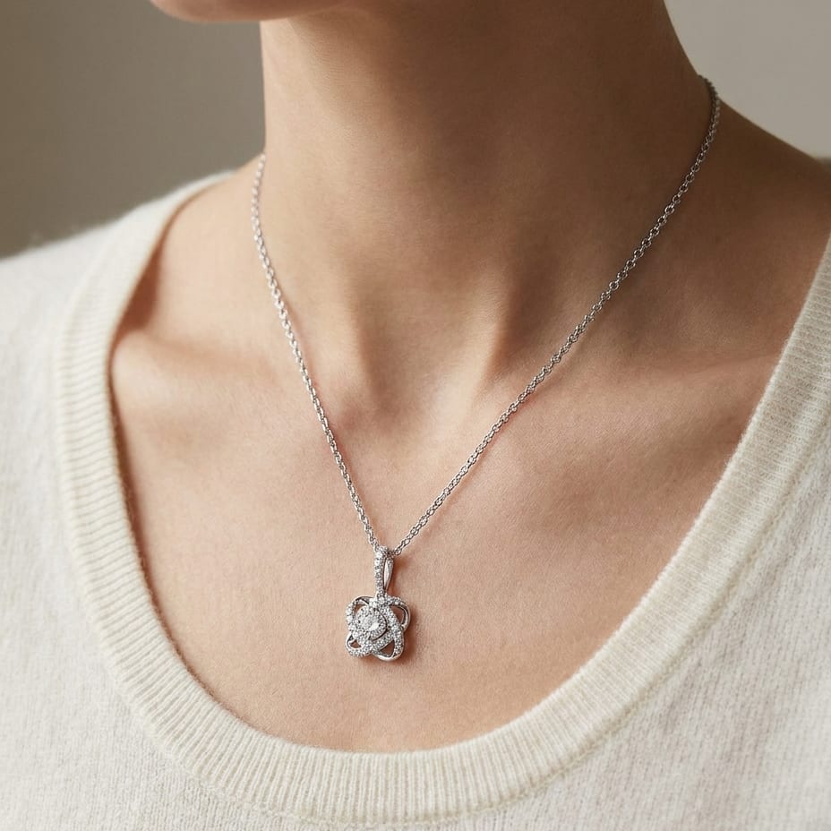 Natural Diamond Round Brilliant Pendant in 14K White Gold, worn close-up portrait