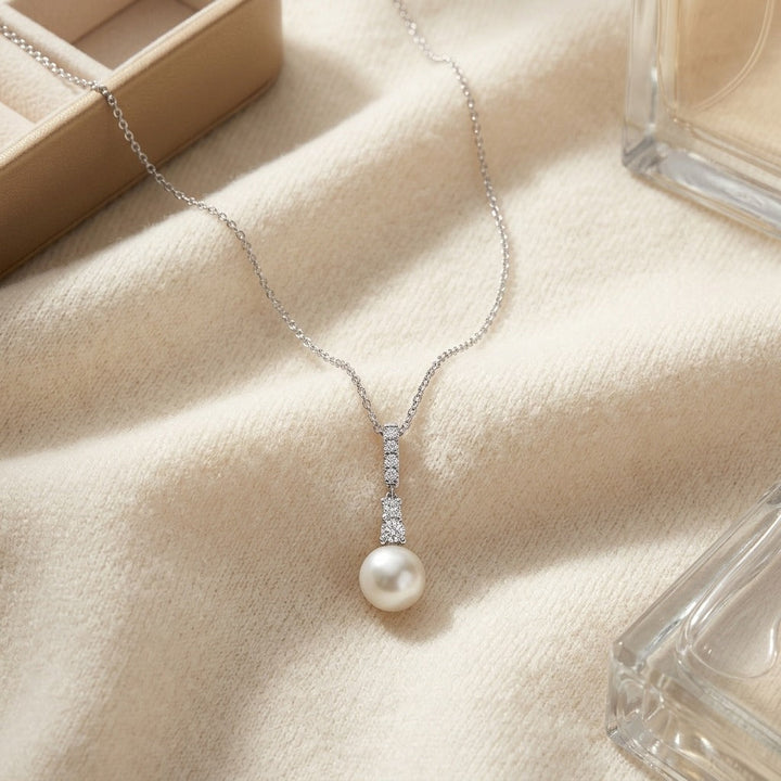 Cultured Pearl & Diamond Pendant with Graduated Prong-Set Bail in 14K White Gold - flat lay