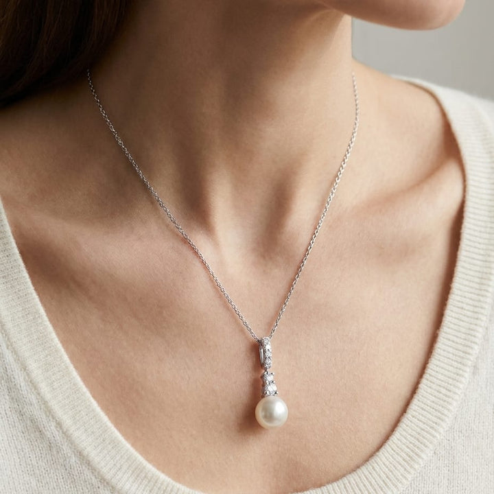 Cultured Pearl Pear Shape Pendant in 14K White Gold, worn close-up portrait