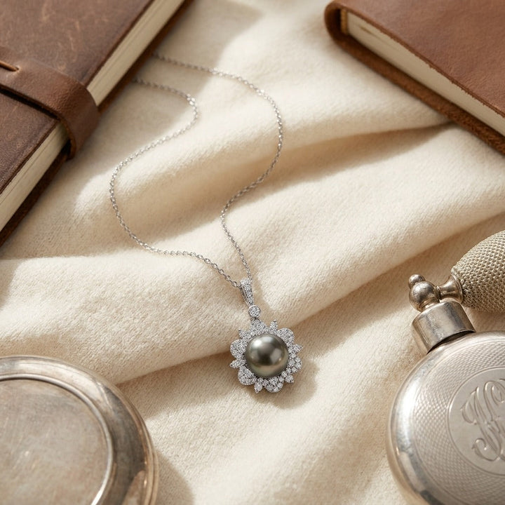 Black Pearl & Diamond Pendant with Arabesque Border in 14K White Gold - flat lay