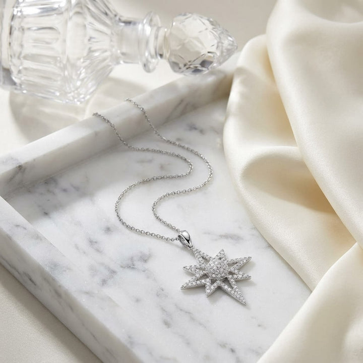 Natural Diamond Round Brilliant Pendant in 14K White Gold, on marble vanity tray with silk