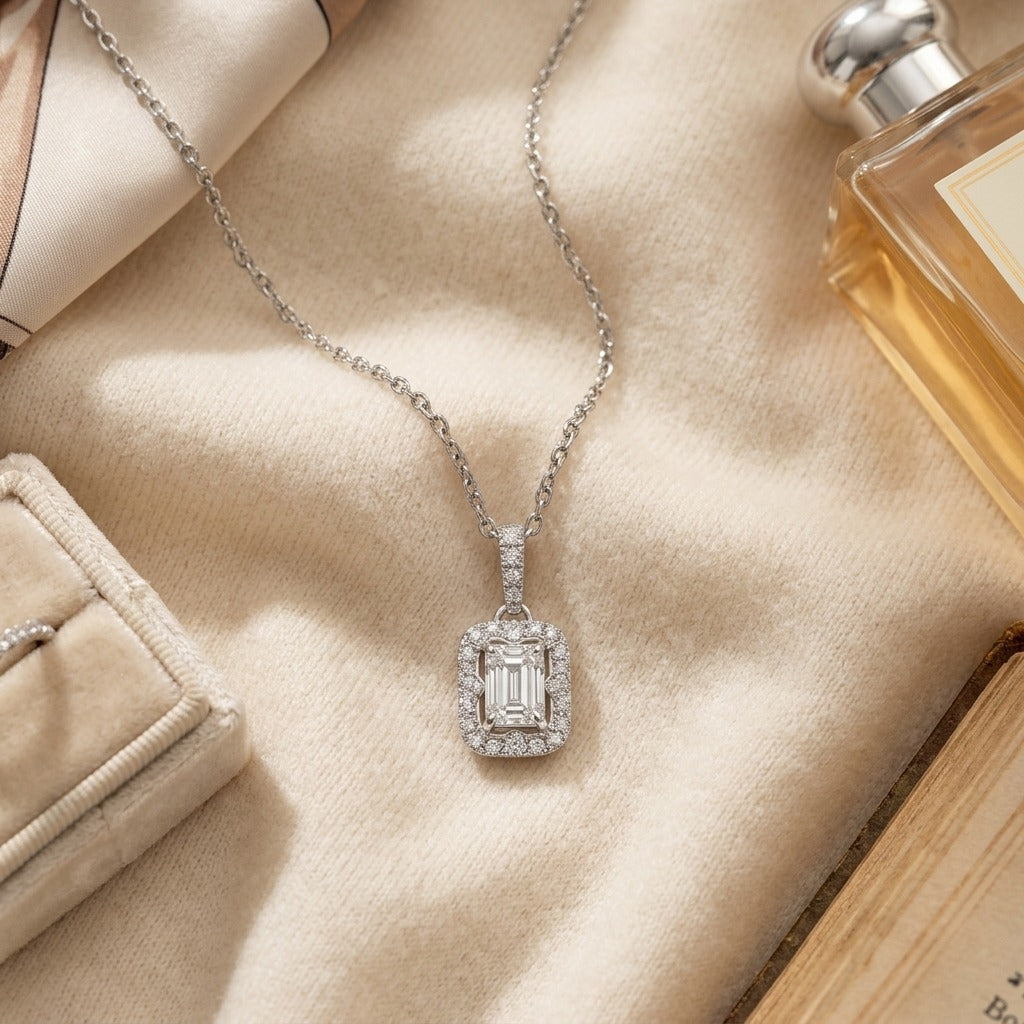 Diamond Rectangular Halo Pendant 3/4ct Emerald Cut Center 9/10ctw 16-18 Inch Adj Chain in 14K White Gold - flat lay