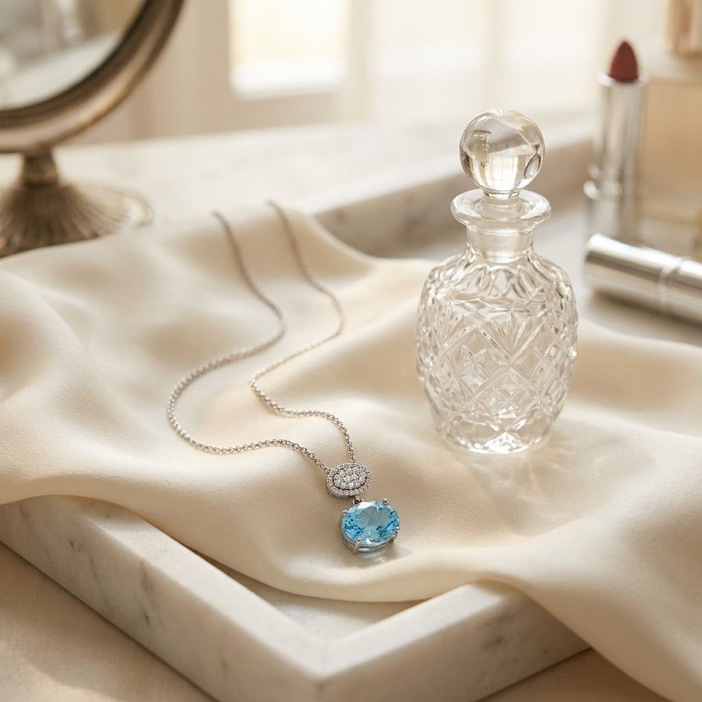 Blue Topaz Oval & Diamond 1/16ctw Pendant Set with Chain in 14K White Gold - editorial