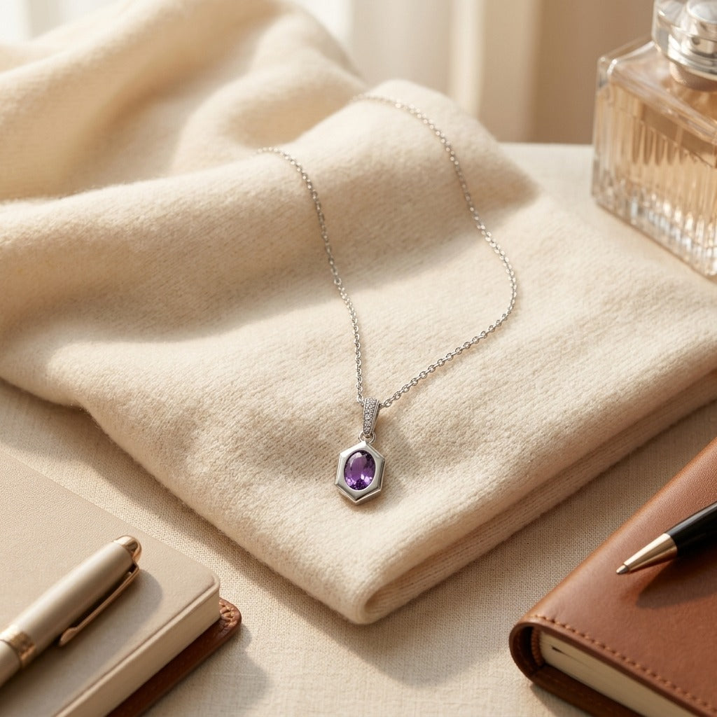 Oval Amethyst Pendant 0.70ct & 0.028ctw Diamond Set 16-18 Adj Chain in 14K White Gold - flat lay