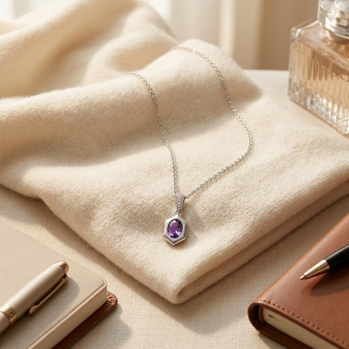 Oval Amethyst Pendant 0.70ct & 0.028ctw Diamond Set 16-18 Adj Chain in 14K White Gold - flat lay