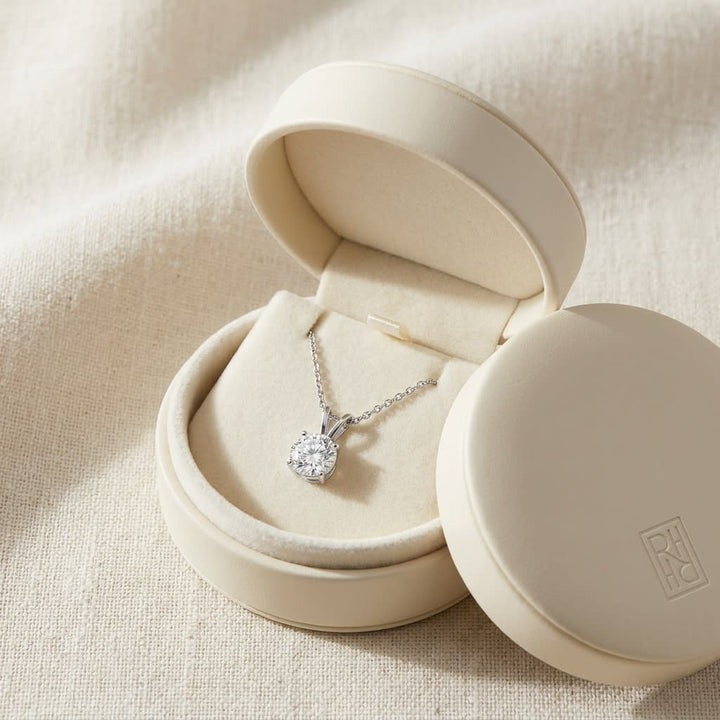 Natural Diamond Round Brilliant Solitaire Pendant in 14K White Gold, 2 ct. t.w., in navy velvet jewelry box