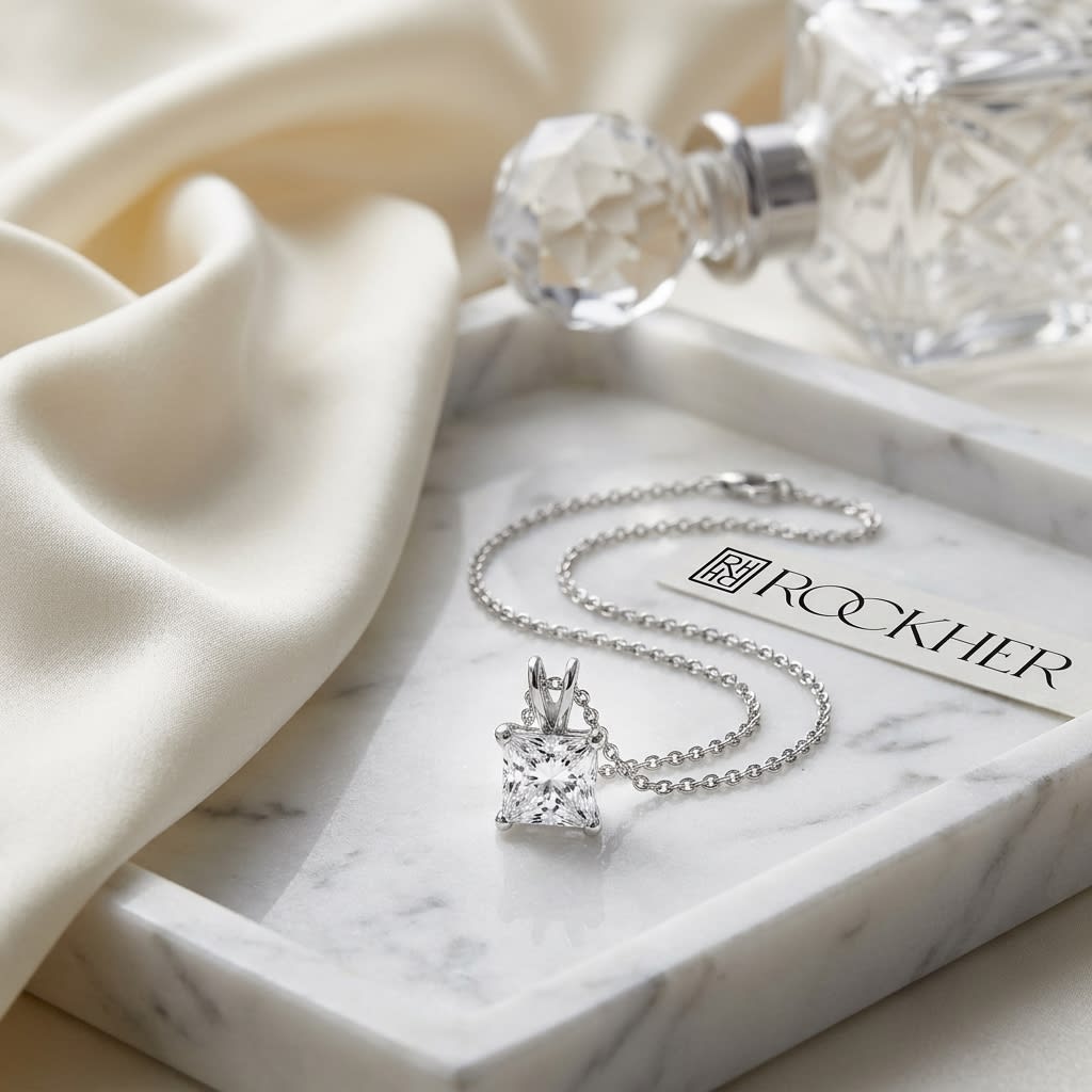Natural Diamond Princess Cut Solitaire Pendant in 14K White Gold, 4 ct. t.w., on marble vanity tray with silk