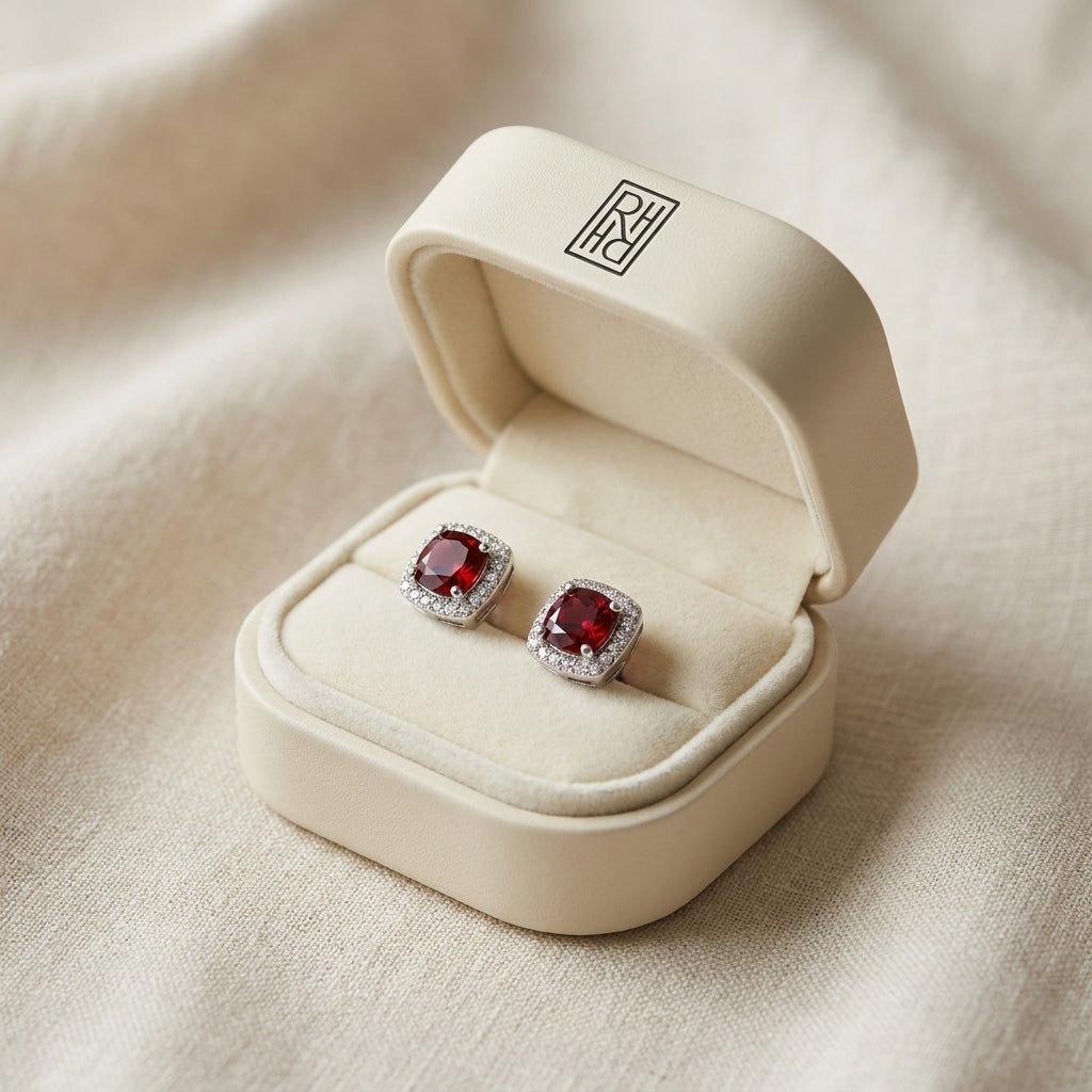 Garnet And Diamond Cushion Halo Earrings In 14k White Gold, in navy velvet jewelry box