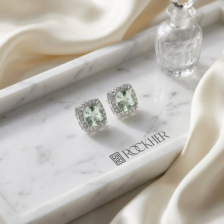 Natural Diamond Round Brilliant Stud Earrings in 14K White Gold, on marble vanity tray with silk