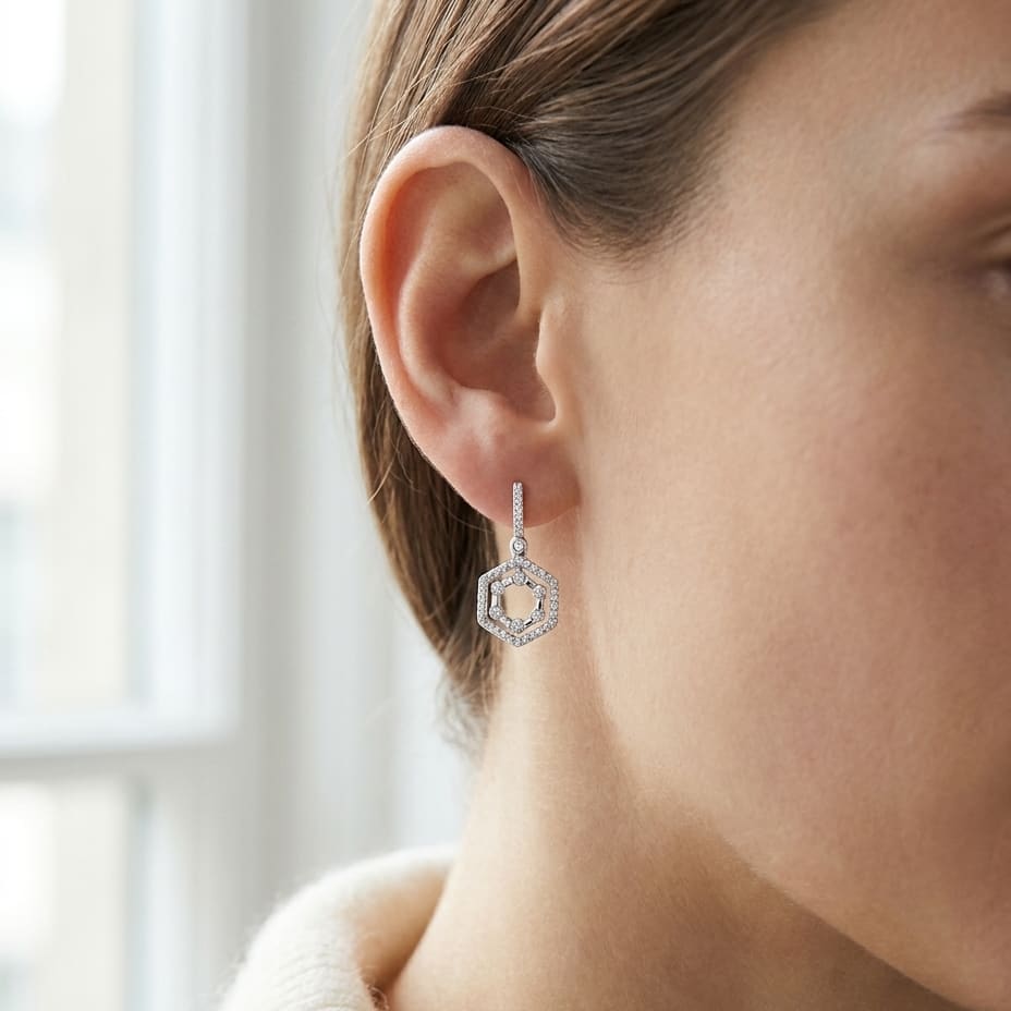 14K White Gold Hexagon Drop Earrings, worn close-up portrait