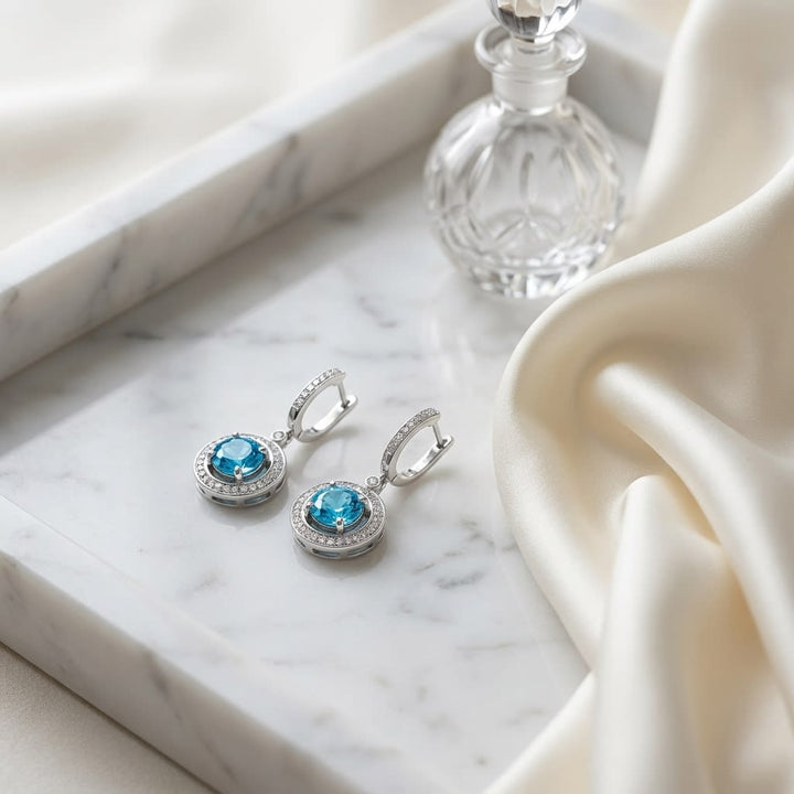 ต่างหูบลูโทแพซ ตัวเรือนทองคำขาว 14K จาก RockHer