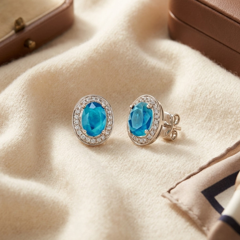 Aquamarine & Diamond Oval Halo Stud Earrings in 14K White Gold - flat lay