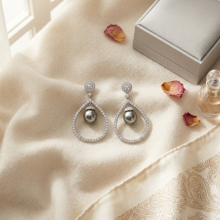 Black Pearl & Diamond Tear Drop Earrings in 14K White Gold - flat lay