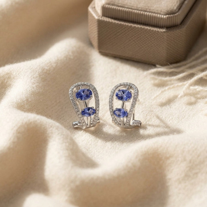 Tanzanite & Diamond Open Work Earrings in 14K White Gold - flat lay