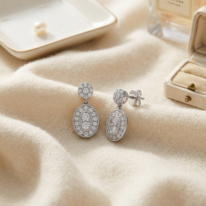 Diamond Oval Halo Dangle Earrings in 14K White Gold - flat lay