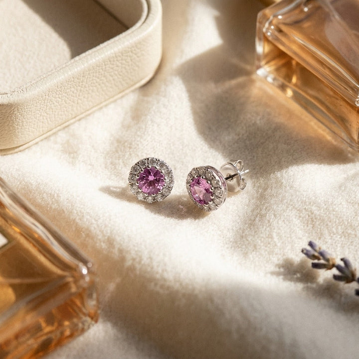 Pink Sapphire & Diamond Halo Earrings in 14K White Gold - flat lay