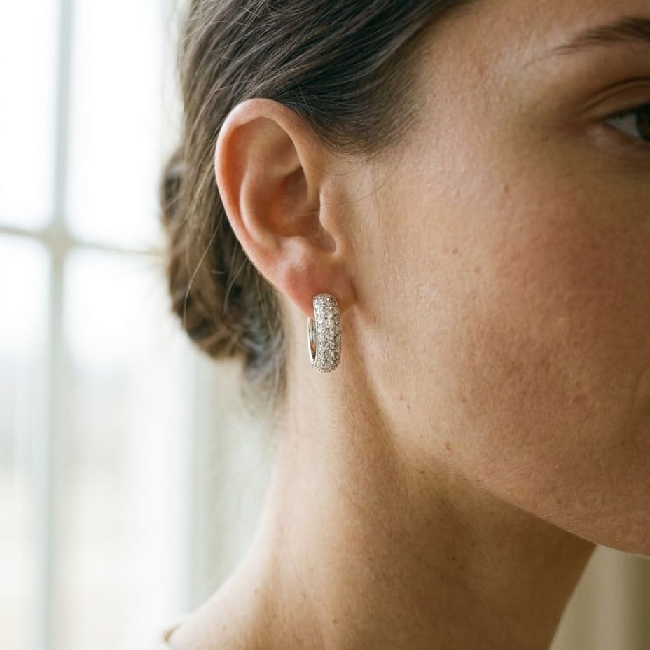 Diamond Pavé Hoop Earrings in 14K White Gold, worn close-up portrait