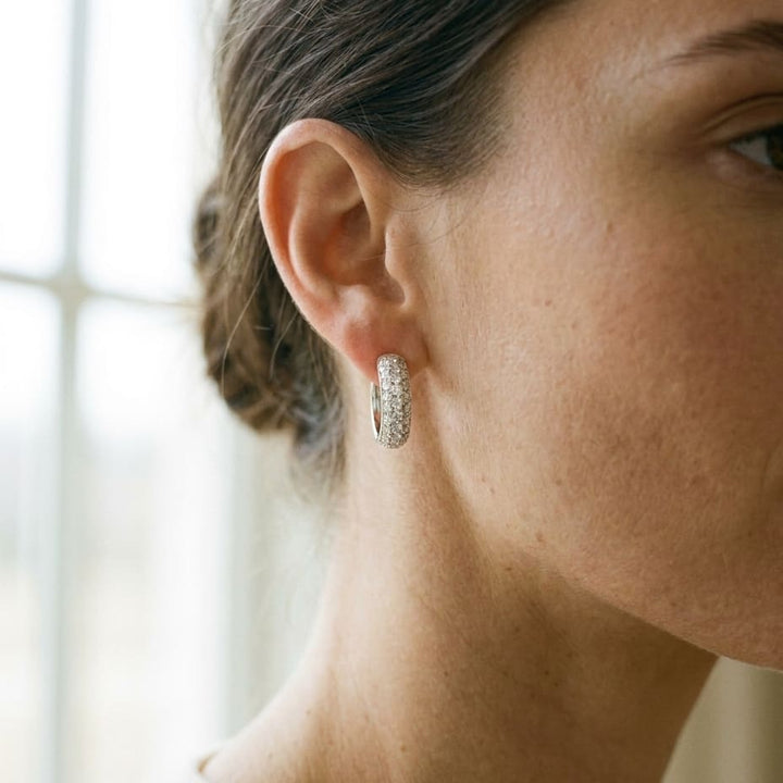 Diamond Pavé Hoop Earrings in 14K White Gold, worn close-up portrait