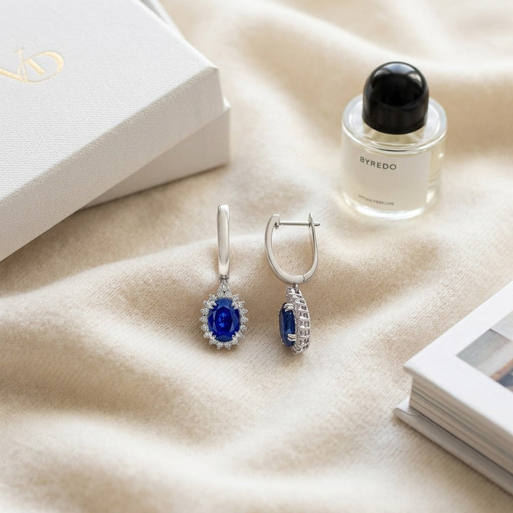 Sapphire Oval & Diamond Starburst Frame Earrings in 14K White Gold - flat lay