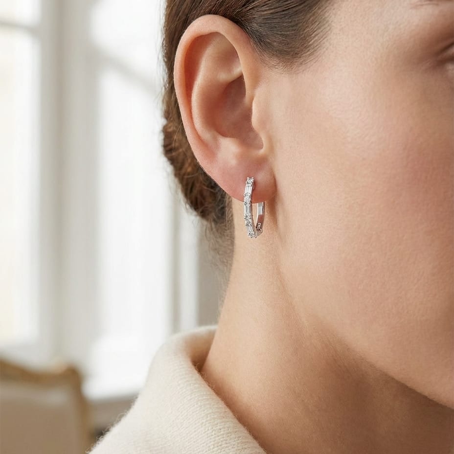 Diamond Baguette And Round Hoop Earrings in 14K White Gold, worn close-up portrait