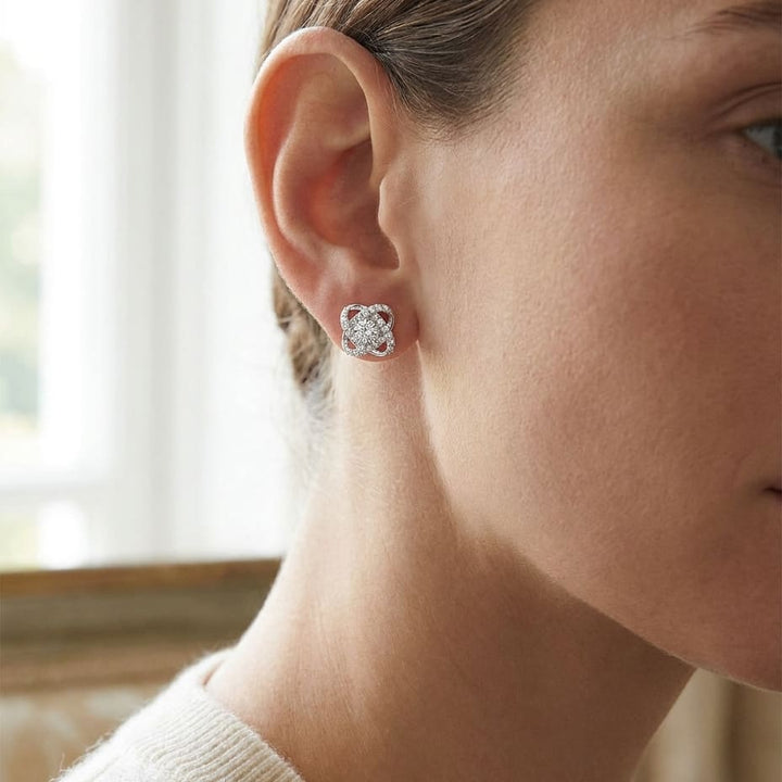 Natural Diamond Round Brilliant Stud Earrings in 14K White Gold, worn close-up portrait