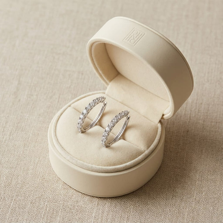 Diamond Pave Single Row Outside Oval Hoop Earrings in 14K White Gold, in navy velvet jewelry box