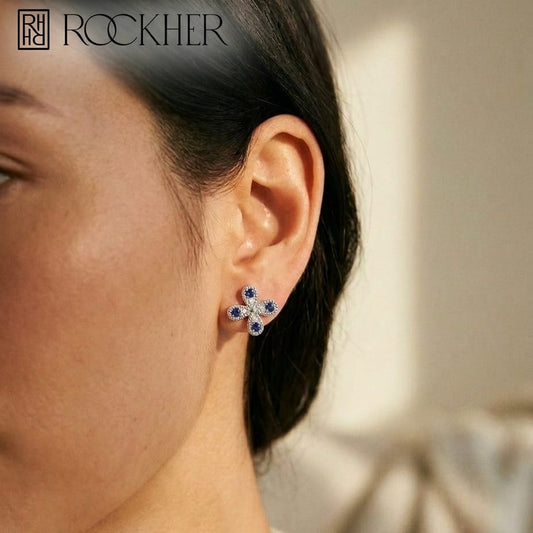 Sapphire and Diamond Clover Floral Stud Earrings in 14k White Gold 0.08ctw, worn close-up portrait