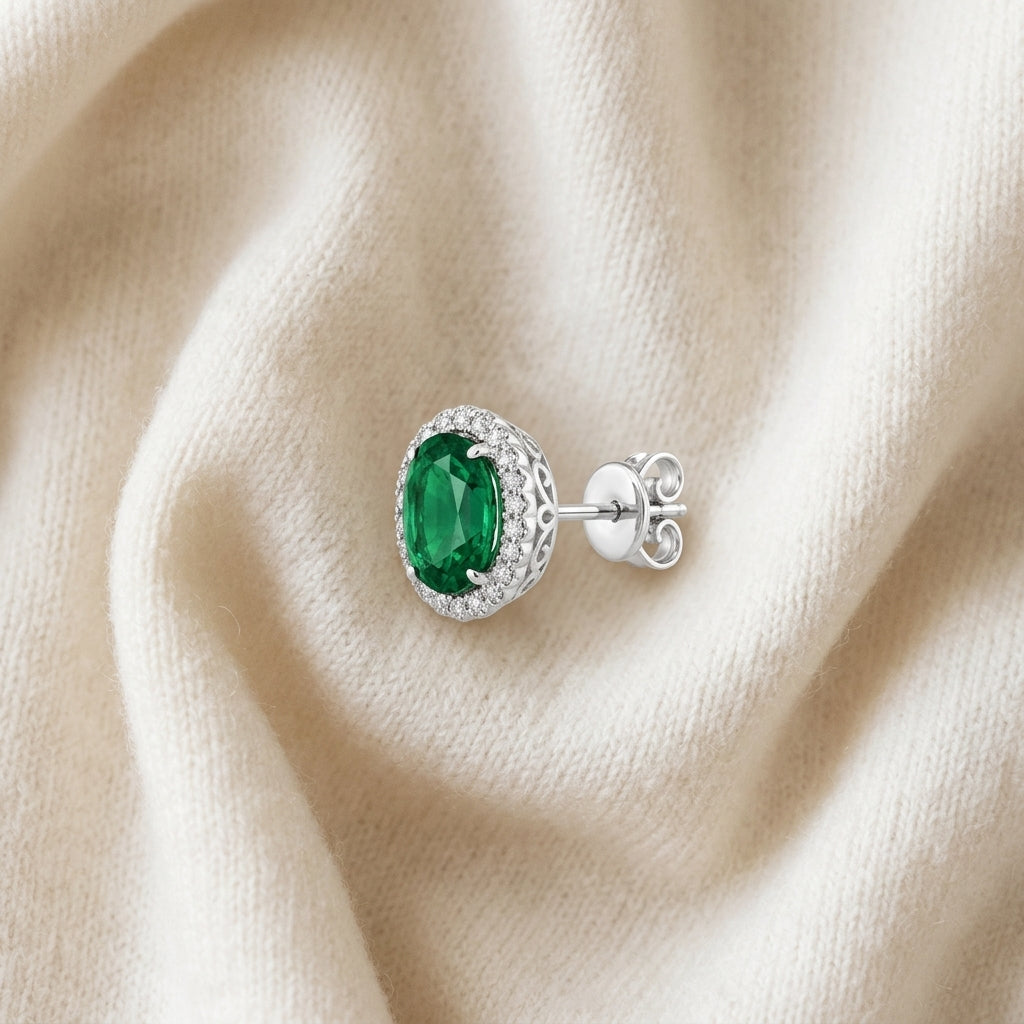 Created Emerald & Diamond Oval Halo Stud Earrings 1/5ctw in 14K White Gold - flat lay
