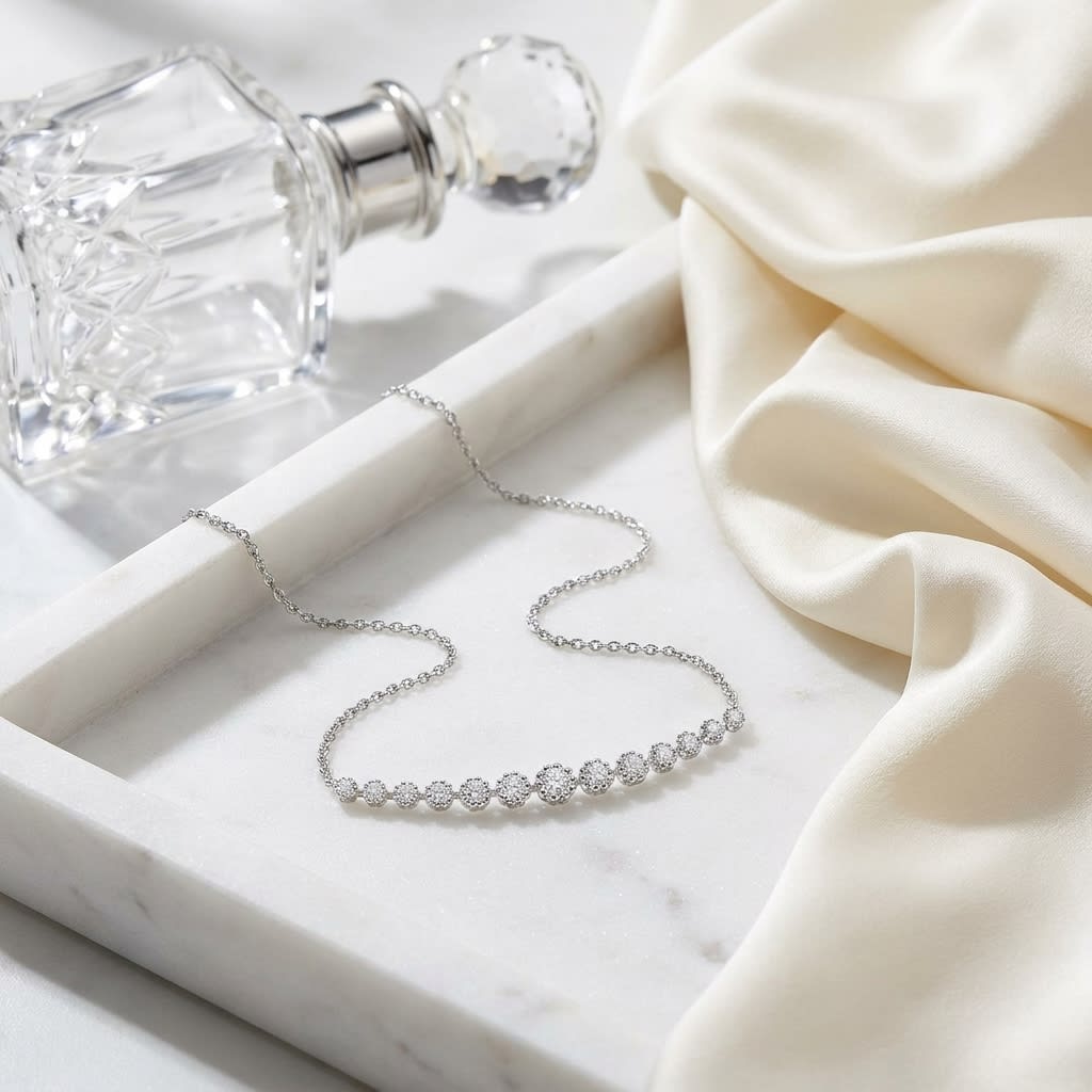 Diamond 13-stone Floral Millgrained Necklace in 14K White Gold (1/3 Ct.tw.), on marble vanity tray with silk