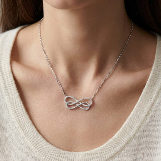Diamond Double Infinity Necklace in 14K White Gold (2/3 Ct.tw.), worn close-up portrait