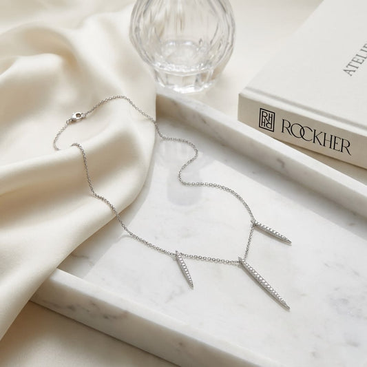 Diamond Pave Icicles Necklace in 14K White Gold, on marble vanity tray with silk
