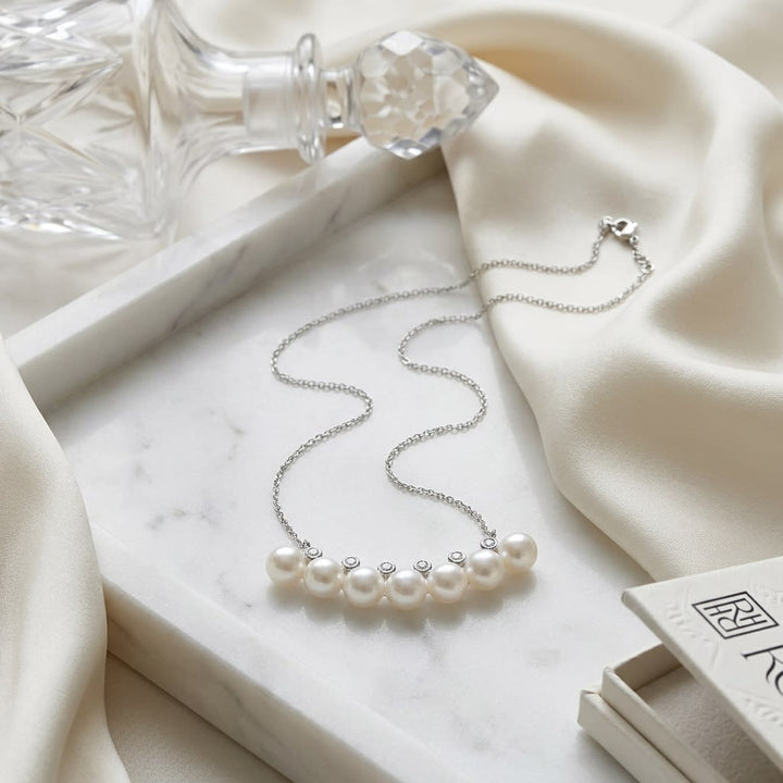 Freshwater Pearl Bar Necklace in 14K White Gold, 16-18 Inch Chain, on marble vanity tray with silk