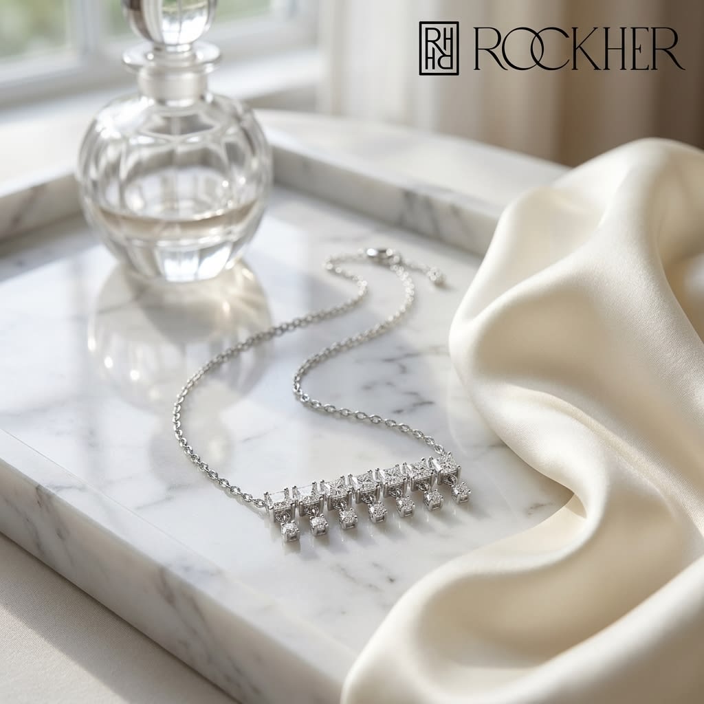 Diamond Princess Cut And Round Fringe Bar Necklace in 14K White Gold, 16-18 Inch Adj Chain, on marble vanity tray with silk