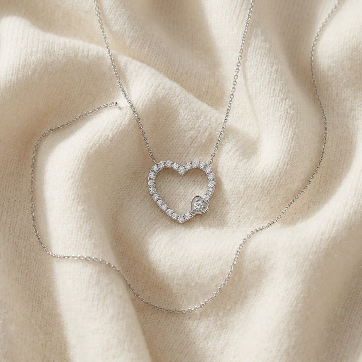 Diamond 1/2ctw Heart Necklace with 16/18 Adj Chain Set in 14K White Gold - flat lay