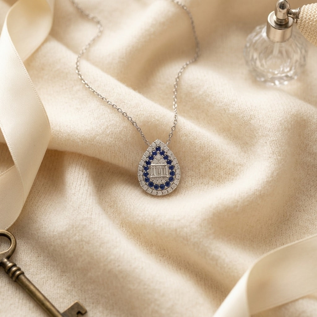 Sapphire & Diamond Pear Shape Necklace 16-18 Inch Adjustable Cable Chain in 14K White Gold - flat lay