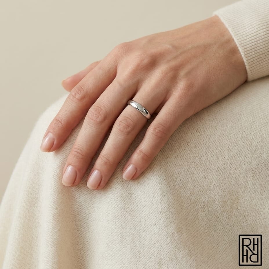 2.5mm Slightly Domed Traditional Oval Wedding Band in 14K White Gold, worn on hand, full view