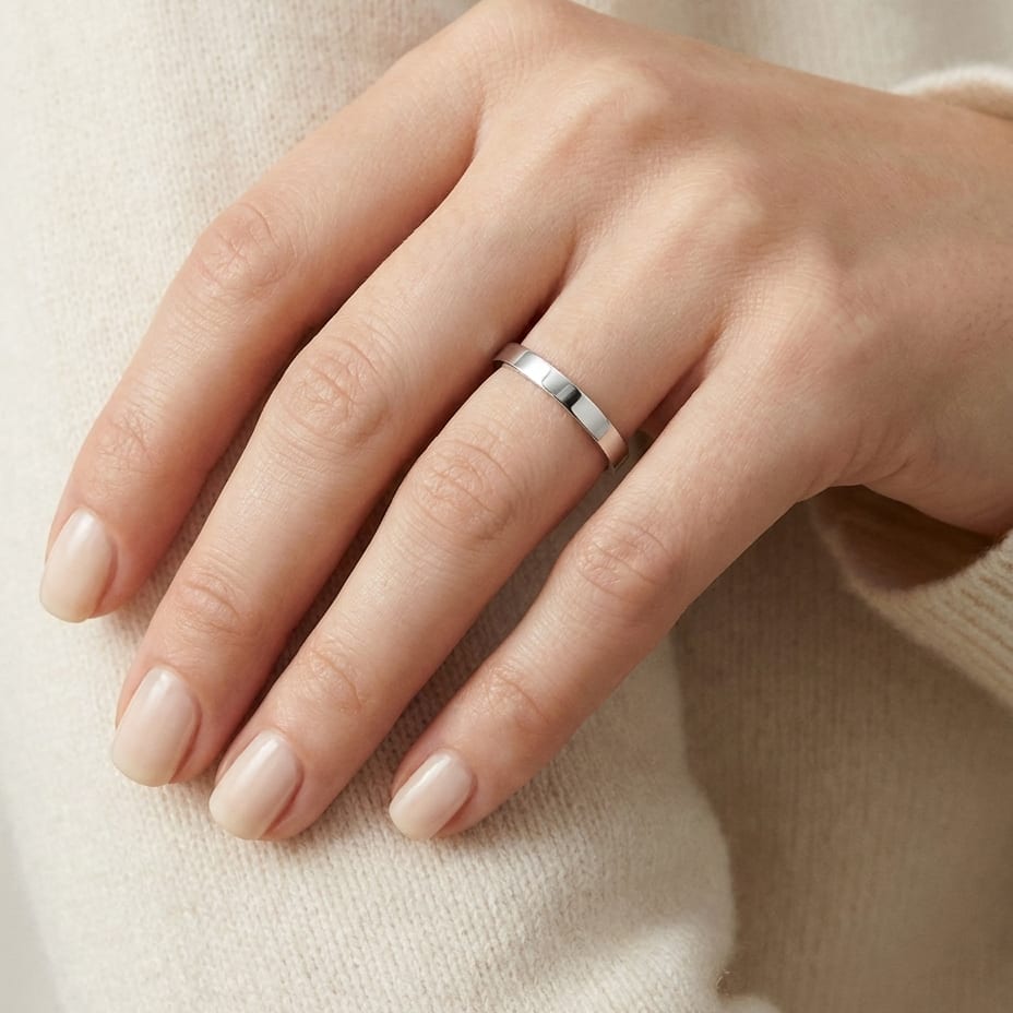 2mm Traditional Flat Wedding Band in 14K White Gold, worn on hand, close-up
