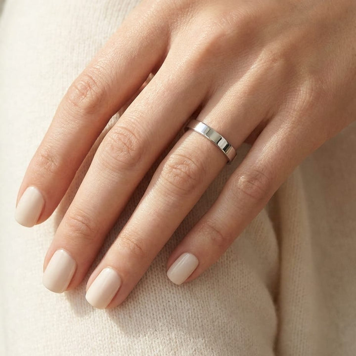 3mm Traditional Flat Wedding Band in 14K White Gold, worn on hand, close-up