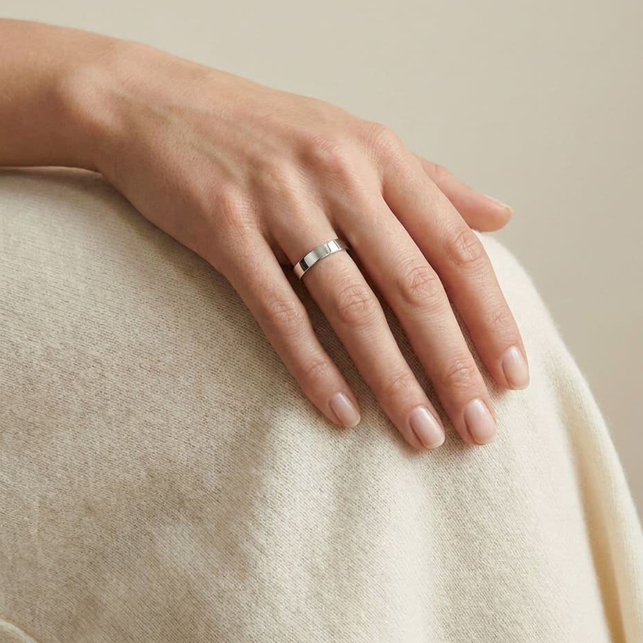 4mm Flat Comfort-Fit Wedding Band in 14K White Gold, worn on hand, full view