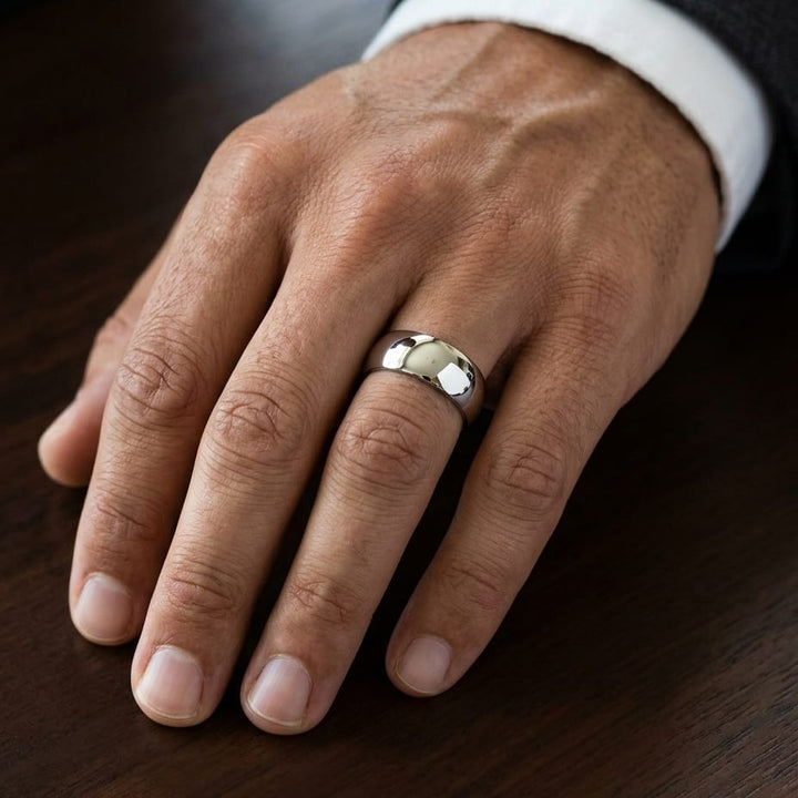 10mm High Dome Comfort-Fit Wedding Band in 14K White Gold, worn on hand, masculine close-up