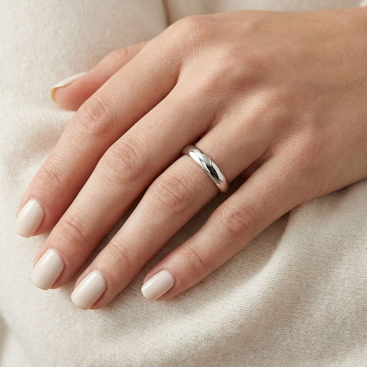 3mm Slightly Domed Comfort-Fit Wedding Band in 14K White Gold, worn on hand, close-up