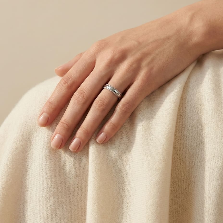 4mm Slightly Domed Milgrain Comfort-Fit Wedding Band in 14K White Gold, worn on hand, full view