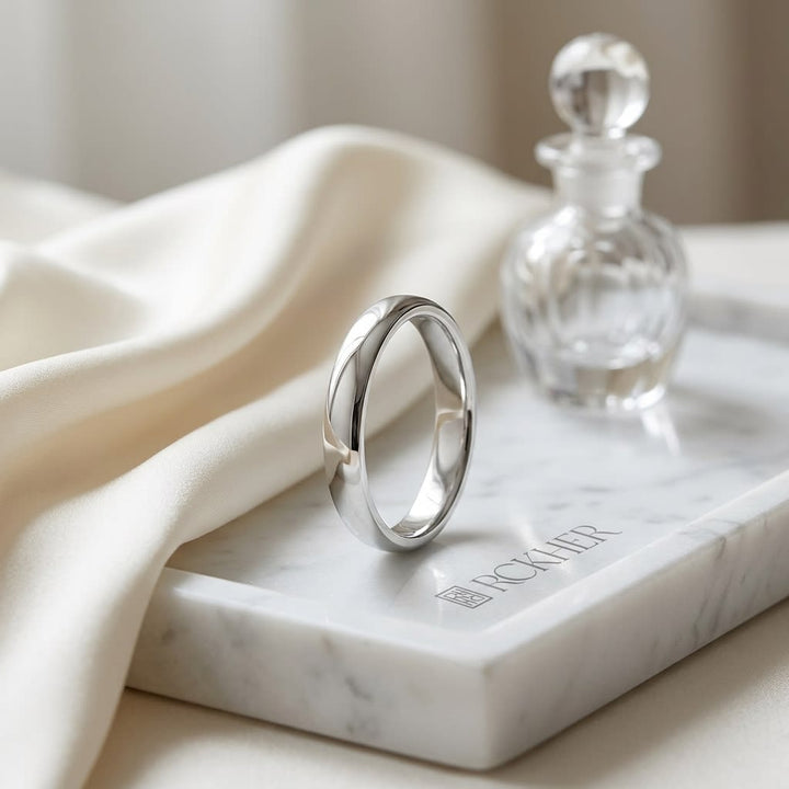 3mm Slightly Domed Super Light Comfort-Fit Wedding Band in 14K White Gold, on marble vanity tray with silk